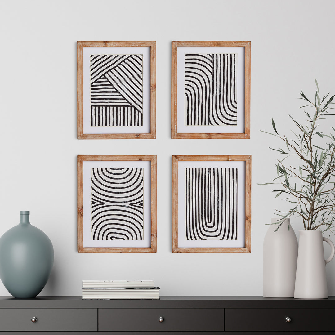 These Achromatic Linear Petite Prints showcase a traditional wood block printing technique, resulting in a visually compelling monochromatic design. The varied ink saturation adds depth and texture to each print, beautifully complemented by the elegant neutral wood frames. A must-have set for any refined and sophisticated office or study space.