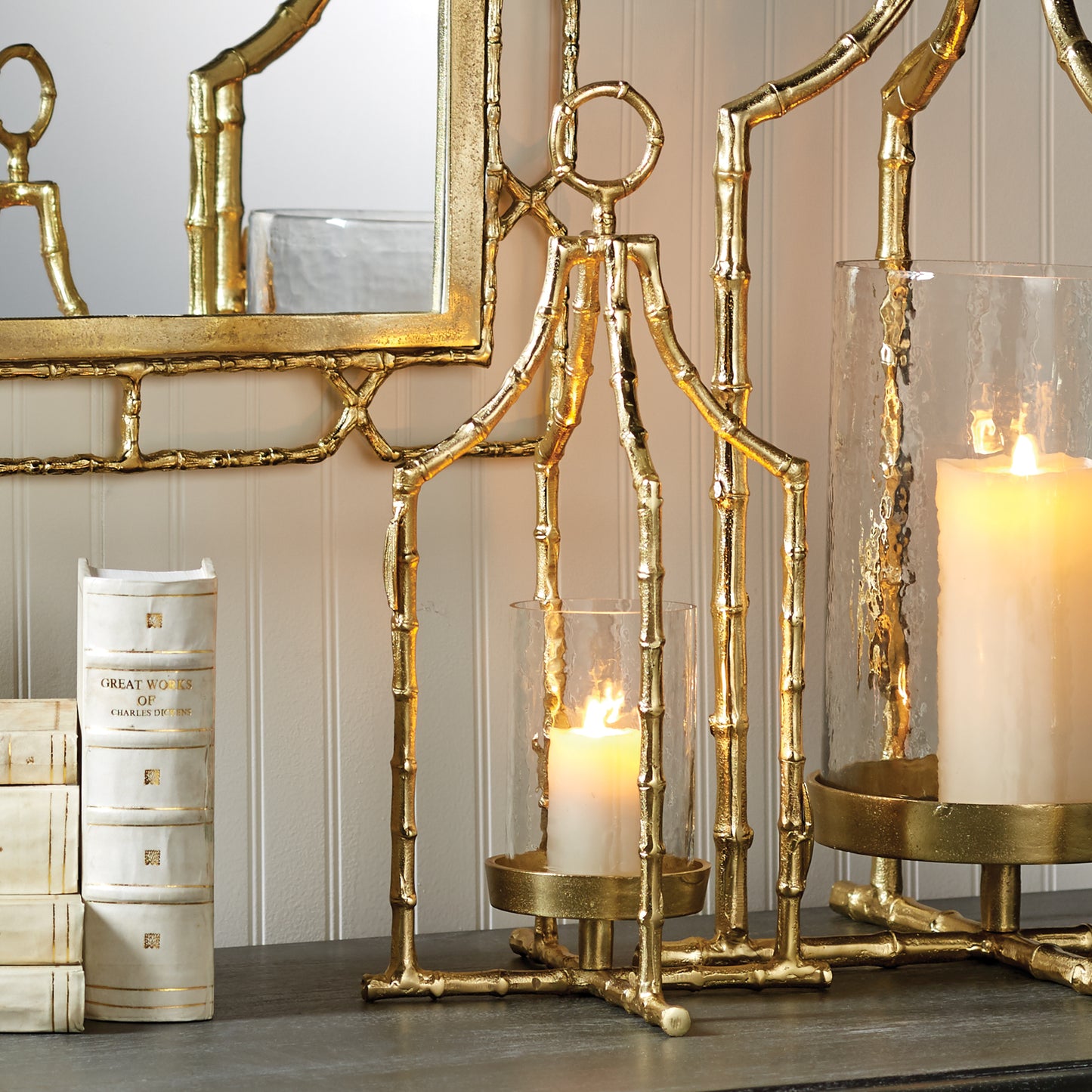 With its elegant gold bamboo design and beautiful seeded glass insert, this lantern is the perfect addition to any space. Its loop feature adds both height and sophistication, creating an elegant focal point that draws the eye upward.