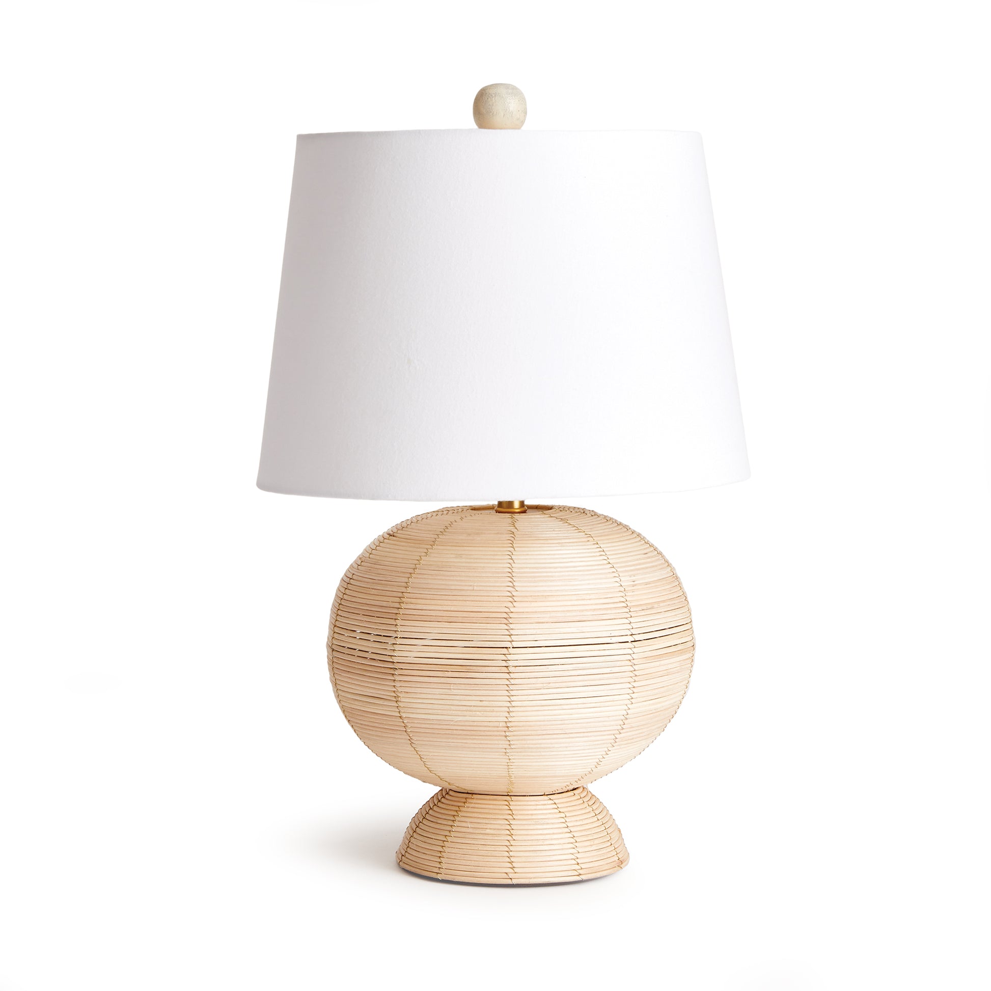 Woven in a whitewash cane rattan, with subtle variations in color that makes each one truly unique, this hourglass lamp is an instant classic. Topped with a wide cylindrical shade, a perfect accent for bedroom, living room or study.