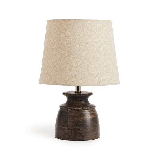 The petite shape makes the Benji Lamp ideal for kitchen or small workspace. The washed black, mango wood Base and natural linen shade give it an elegant touch. This table lamp is perfect for adding a touch of elegance to your kitchen or small workspace. The mango wood base features a washed black finish and pairs beautifully with the natural linen shade.