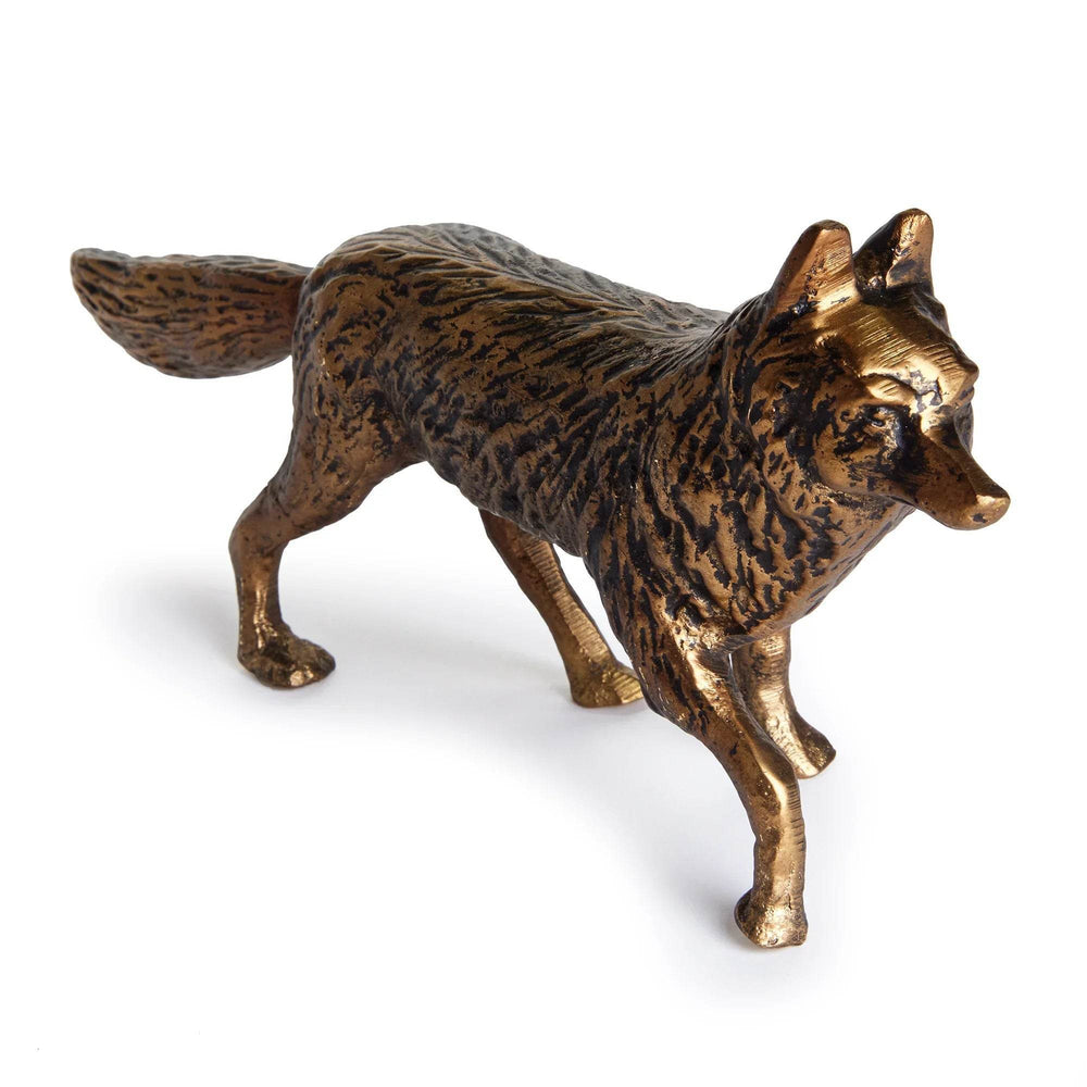 Bronze fox figurine on a white background