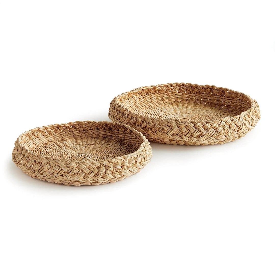 Set of two round abaca display trays with French braid rim in natural fiber, oversized low profile for ottomans and consoles – Coastal.