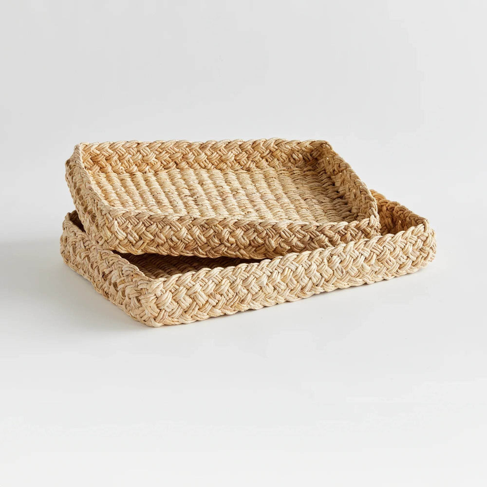 Stacked natural abaca French braided rectangular trays, handwoven basket decor