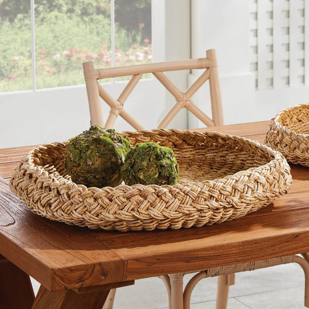Round abaca display tray styled on dining table with green decor, natural woven texture and low rim profile – Coastal.