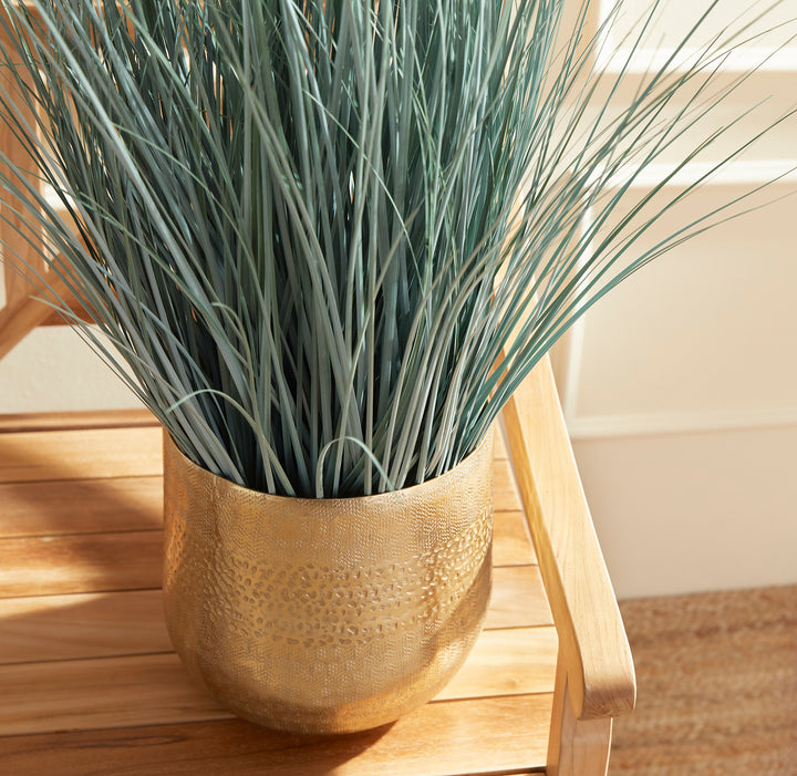 Made to look 100% realistic, this wispy blue oat grass is a natural touch. Drop in to your favorite pot or cachepot and add some coastal appeal to your space. Enhance your decor with natural, realistic botanicals. This blue oat grass adds a touch of coastal charm to any room.