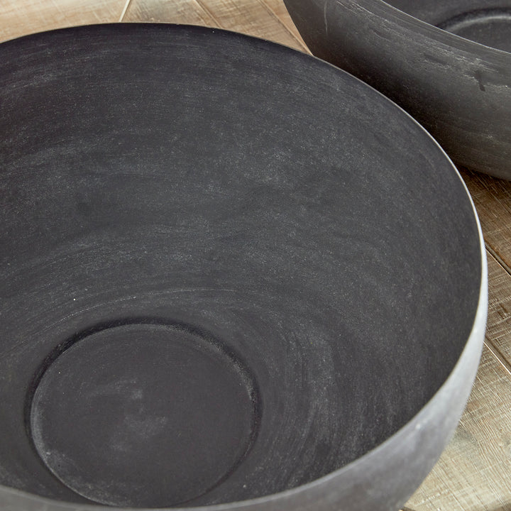 With a look reminiscent of an aged European zinc, these decorative bowls are made to maintain the original finish over time, even when exposed to the elements. Durable as well as beautiful. How brilliant! Fill with natural or ceramic orbs, or display as is for a simply beautiful accent.