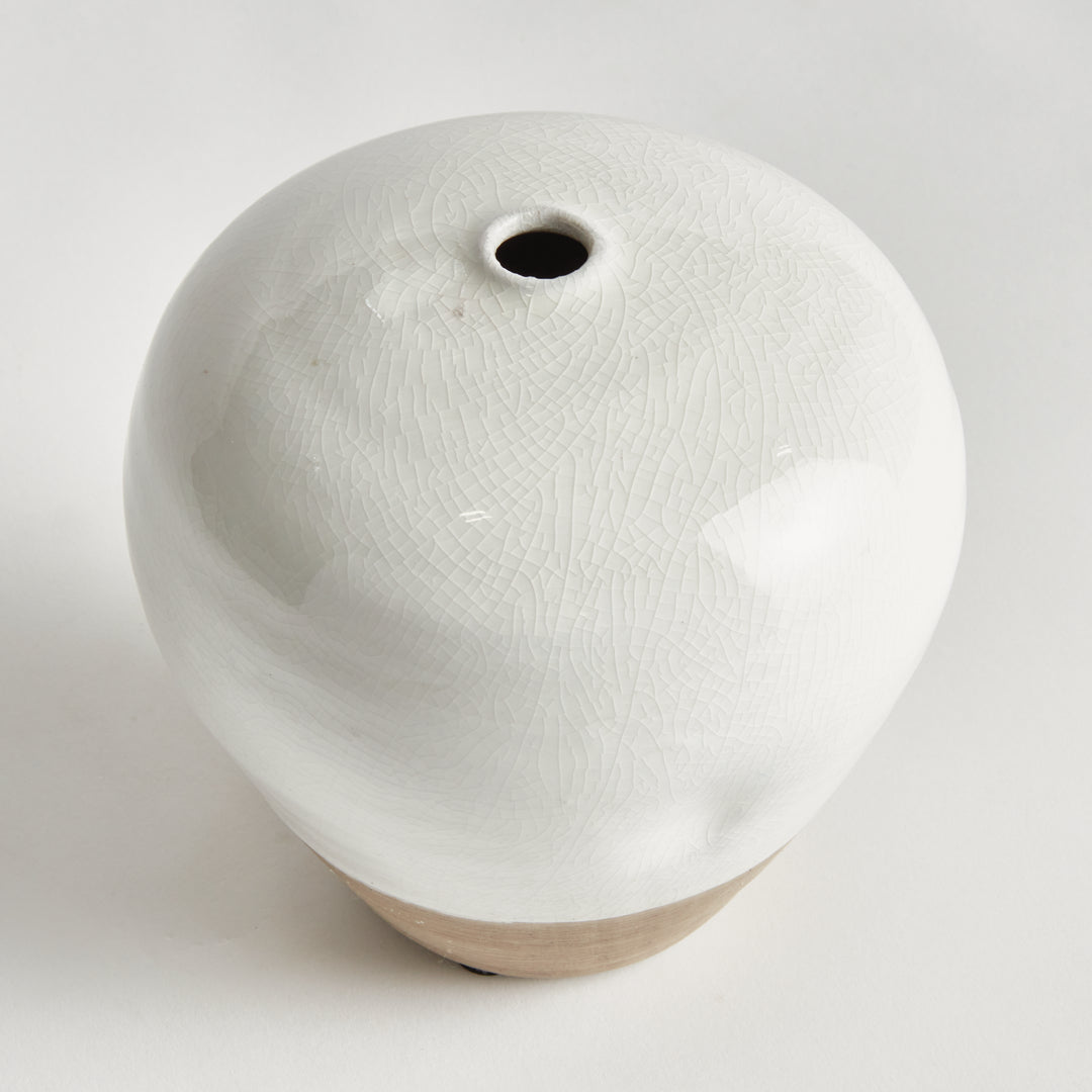 Top view of Alba small vase showing a narrow opening and glossy white reactive glaze on its curved shoulders. Modern Organic