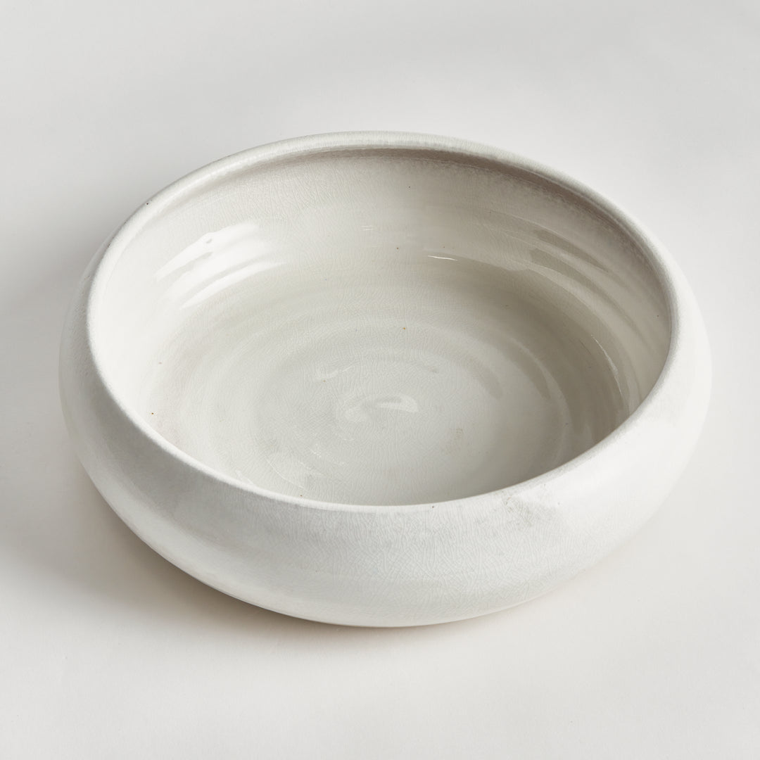 Top view of Alba white terracotta bowl showing an open interior, rounded rim and glossy reactive glaze coat. Modern Organic