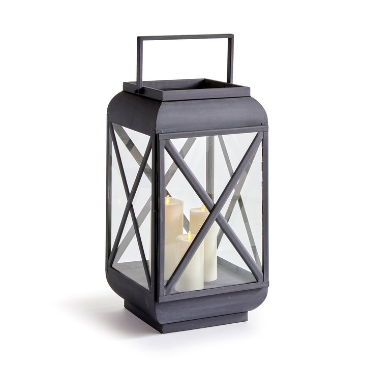 Medium outdoor metal lantern with iron frame, glass panels, and architectural cross-brace detailing – European Garden style.