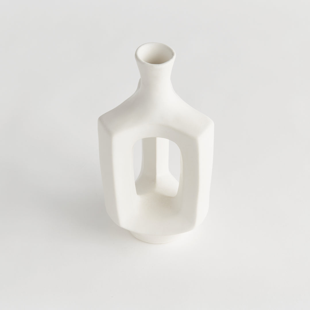 Medium matte white clay vase, angled view showing the hollow center, rounded shoulders and smooth matte glaze. Modern Organic