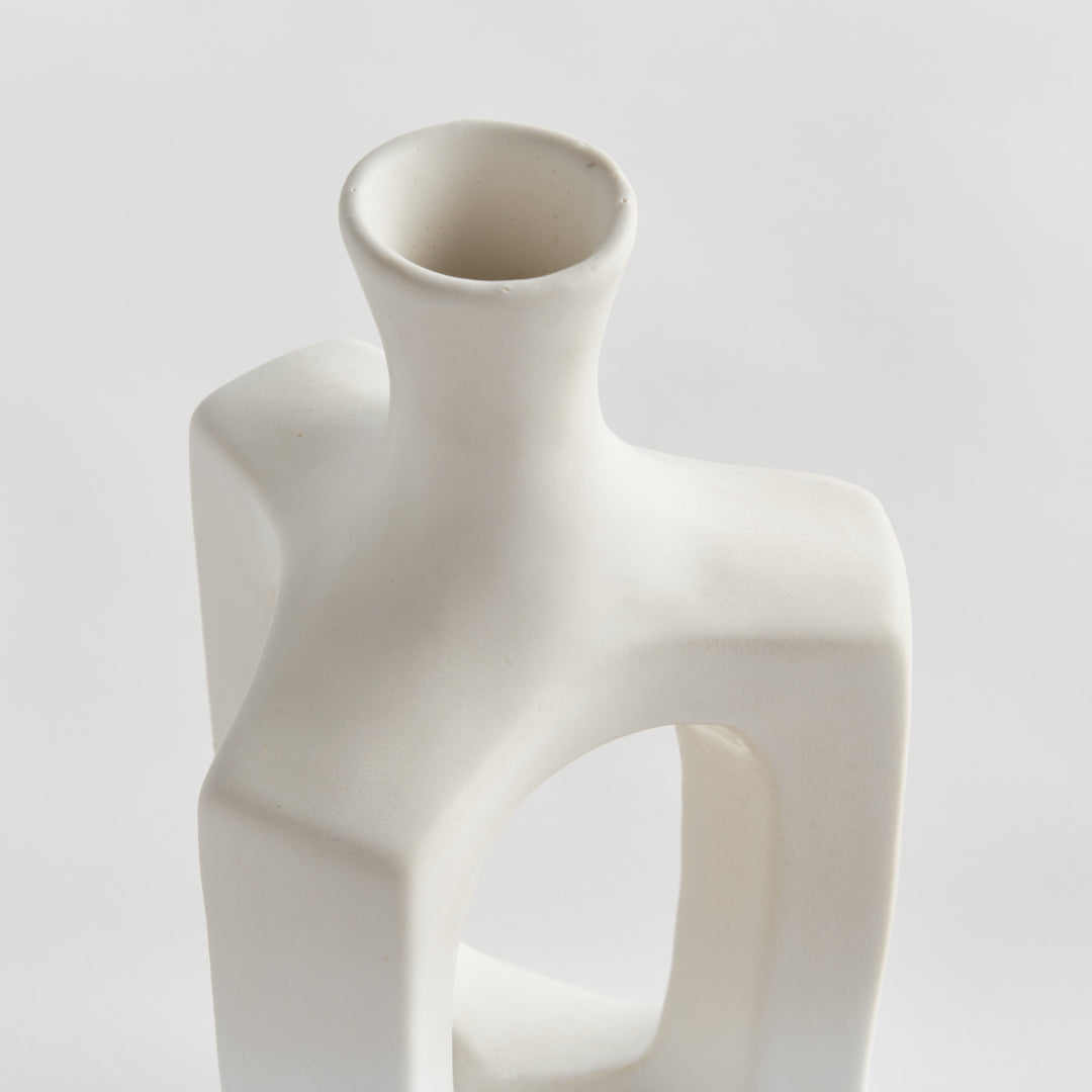 Medium matte white clay vase, detail view showing softly curved edges, white glaze and the open central frame. Modern Organic