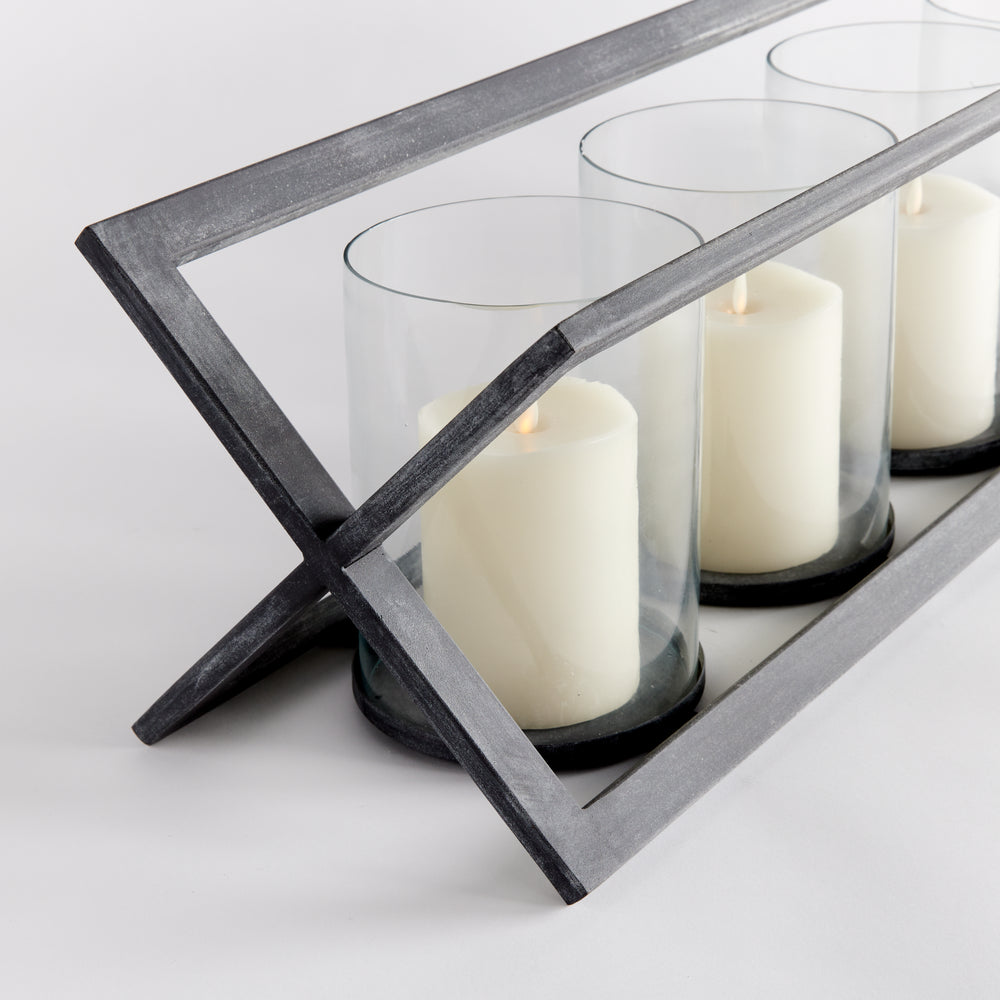 Angled black iron frame with five pillar candles in glass holders – Modern Industrial.