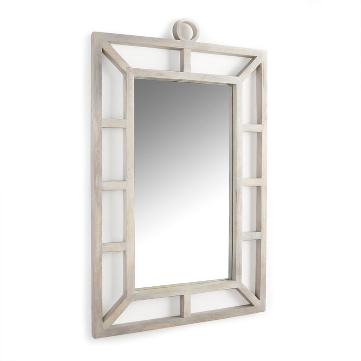 Close-up angle of coastal style rectangular mirror with geometric wood frame