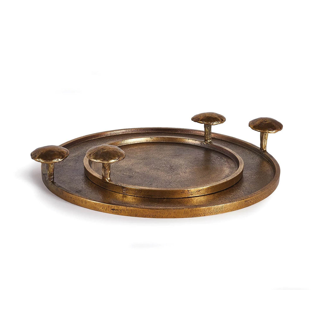 Set of two antique brass cast aluminum decorative trays with round forms and mushroom-inspired handles – Modern Organic.
