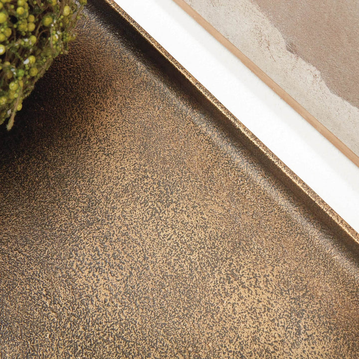Close-up of antique brass rectangular tray surface showing mottled patina and cast aluminum texture – Modern Industrial