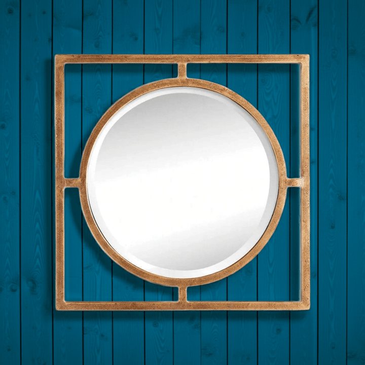 Antique gold 18 inch wall mirror with circular inset, shown on dark blue wall for contrast, adding reflective balance and depth – Traditional décor.