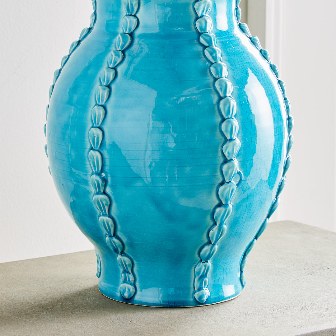 Straight-on view of aqua ceramic vase showing full shape and shell details, handmade in Italy, decorative accent – Coastal Mediterranean


