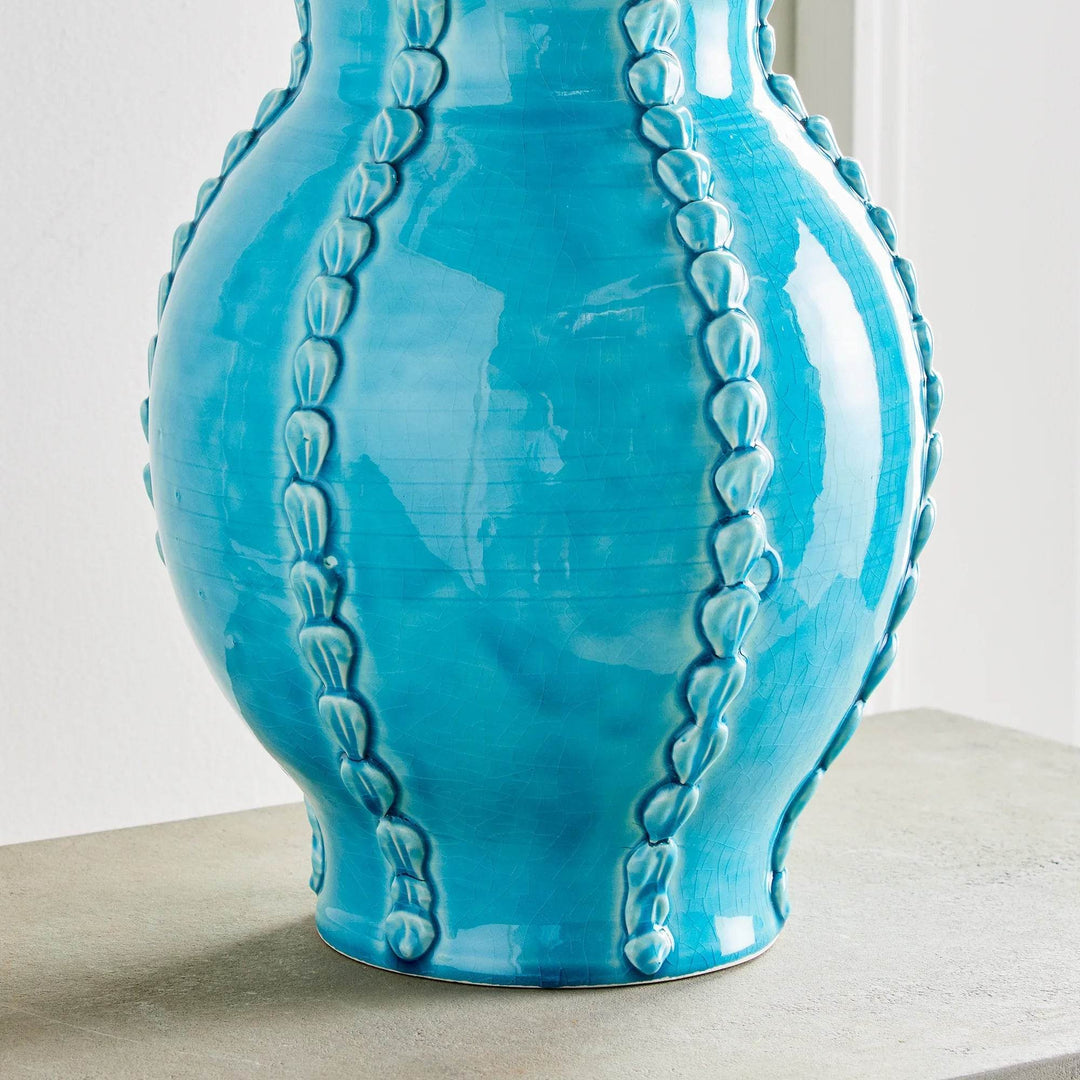 Straight-on view of aqua ceramic vase showing full shape and shell details, handmade in Italy, decorative accent – Coastal Mediterranean

