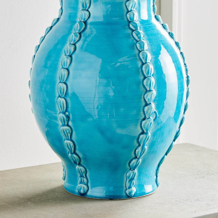 Straight-on view of aqua ceramic vase showing full shape and shell details, handmade in Italy, decorative accent – Coastal Mediterranean


