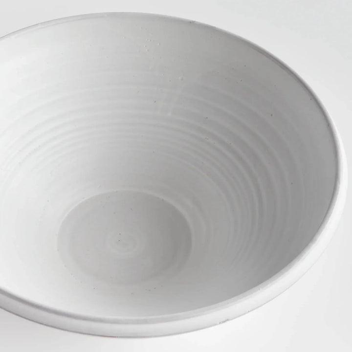 Overhead view of Aveline warm white terracotta bowl showing concentric throwing lines around the interior. Modern Organic