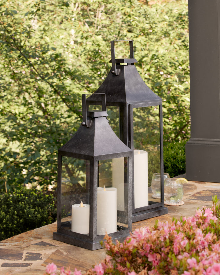 Illuminate your outdoor space with our unique Outdoor Garden Lantern. Boasting a raw, unfinished metal appearance, this lantern adds industrial flair to any setting. Add a selection of our light pillars and create a warm and inviting atmosphere for your outdoor gatherings or events. Transform any space into a cozy and stylish oasis with this must-have lantern.