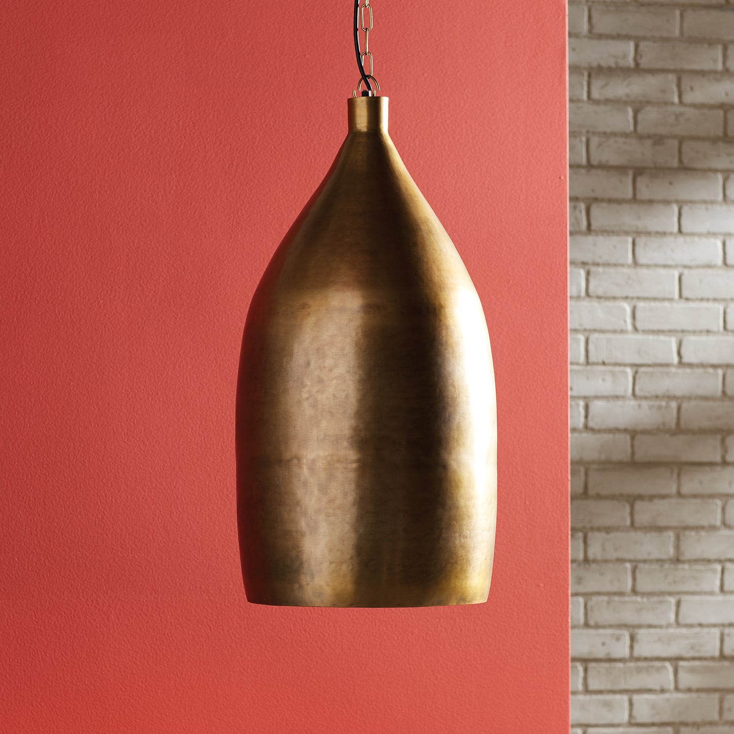 Simple in form but scaled to impress, this antique brass pendant is a real beauty. A handsome choice for over the kitchen table, in the foyer or anywhere. Durable, stylish, and versatile, this antique brass pendant light is a stunning addition to any space. Perfect for elevating the ambiance of your kitchen or foyer, or anywhere else in your home.