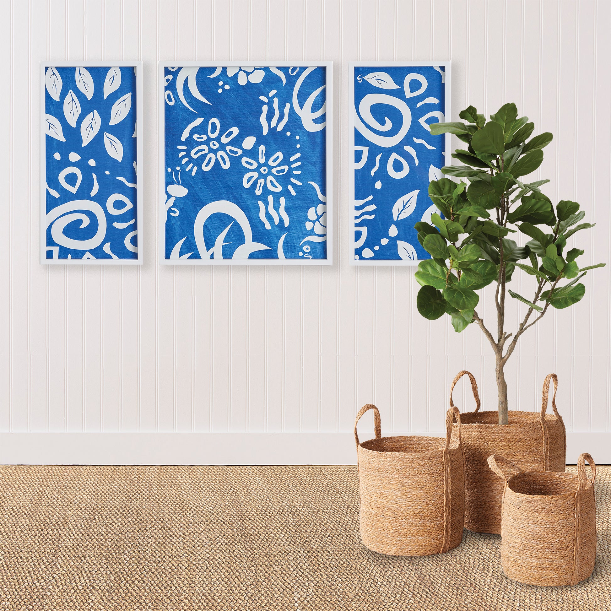 Experience the charming and lively cut-out designs of Susan Nastasic's original artwork with these Whimsical Coastal Wall Prints. Captivatingly showcased in simple white frames, these prints bring a refreshing splash of blue to any space. Perfect for a coastal aesthetic or to add a touch of playfulness to your decor.