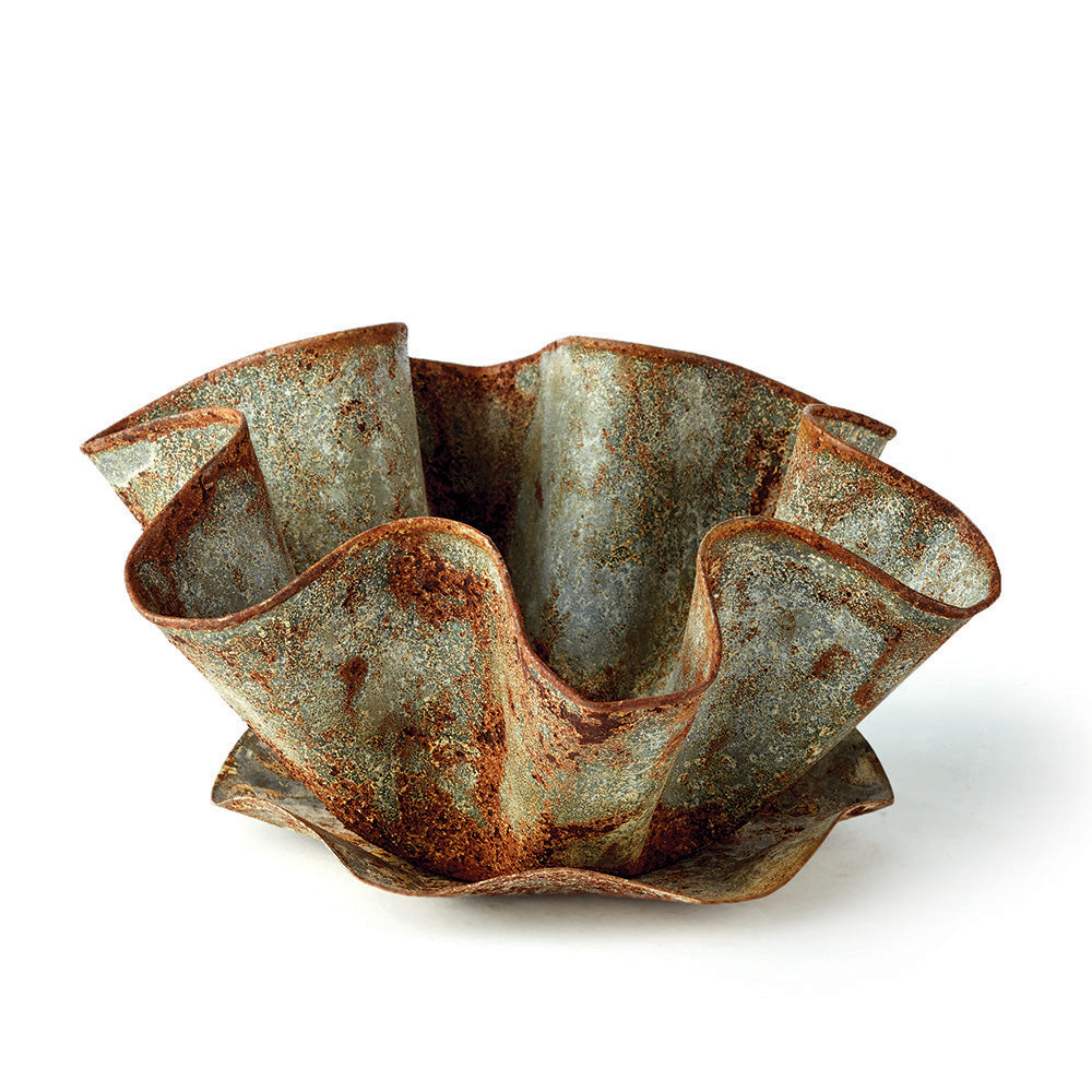 Bexley ruffled iron cachepot with rust-toned antique galvanized finish and a saucer on a pale background. Rustic Farmhouse