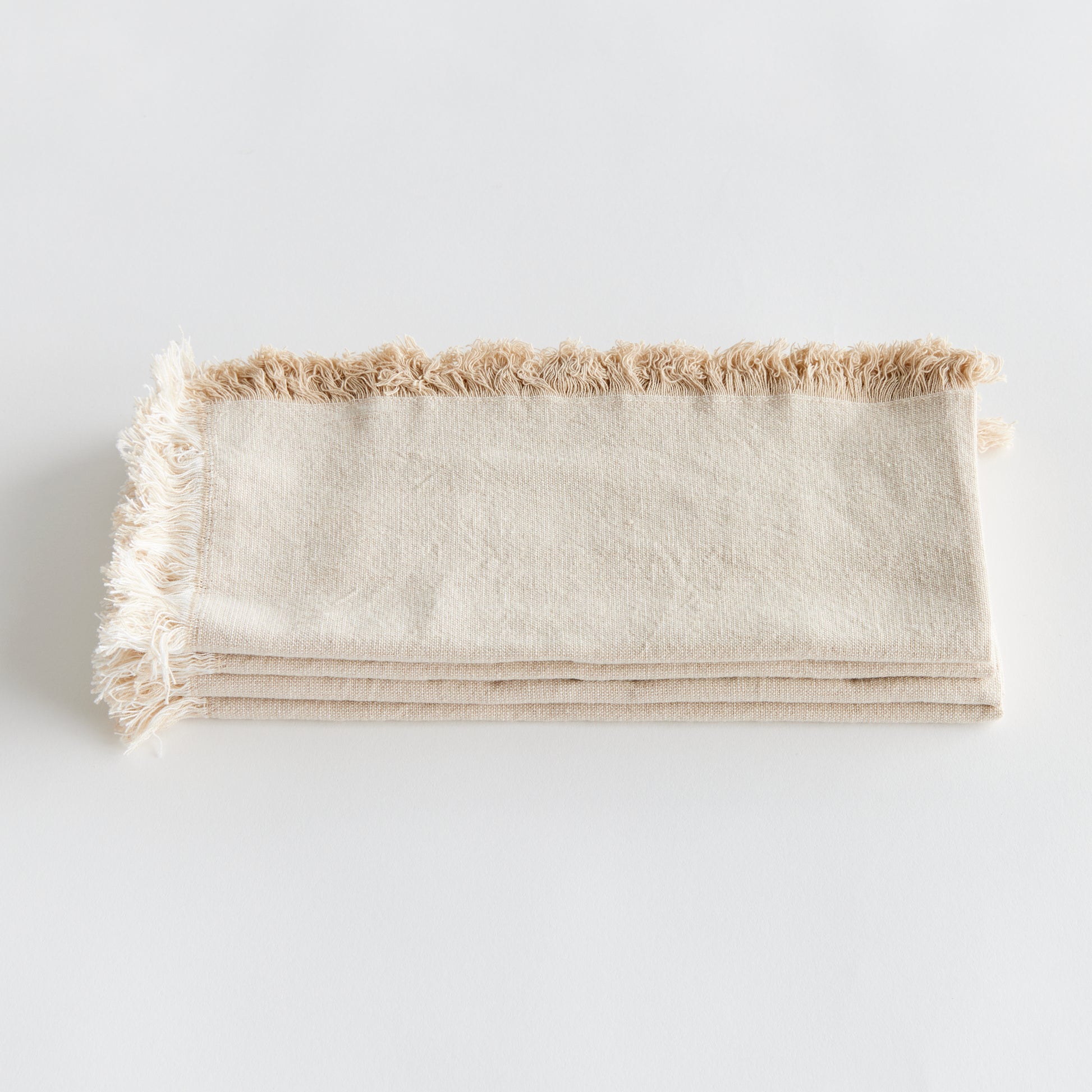 Elevate your dining experience with the Aura Cotton Napkins, Set Of 4. Made from high-quality cotton, these napkins offer a luxurious feel and timeless beauty to any tablescape. The soft taupe color complements any decor, making it a versatile addition to your tableware collection. Each set includes four napkins, perfect for creating a coordinated tablescape for any occasion. Add a touch of elegance to your table with these beautifully toned and textured napkins.