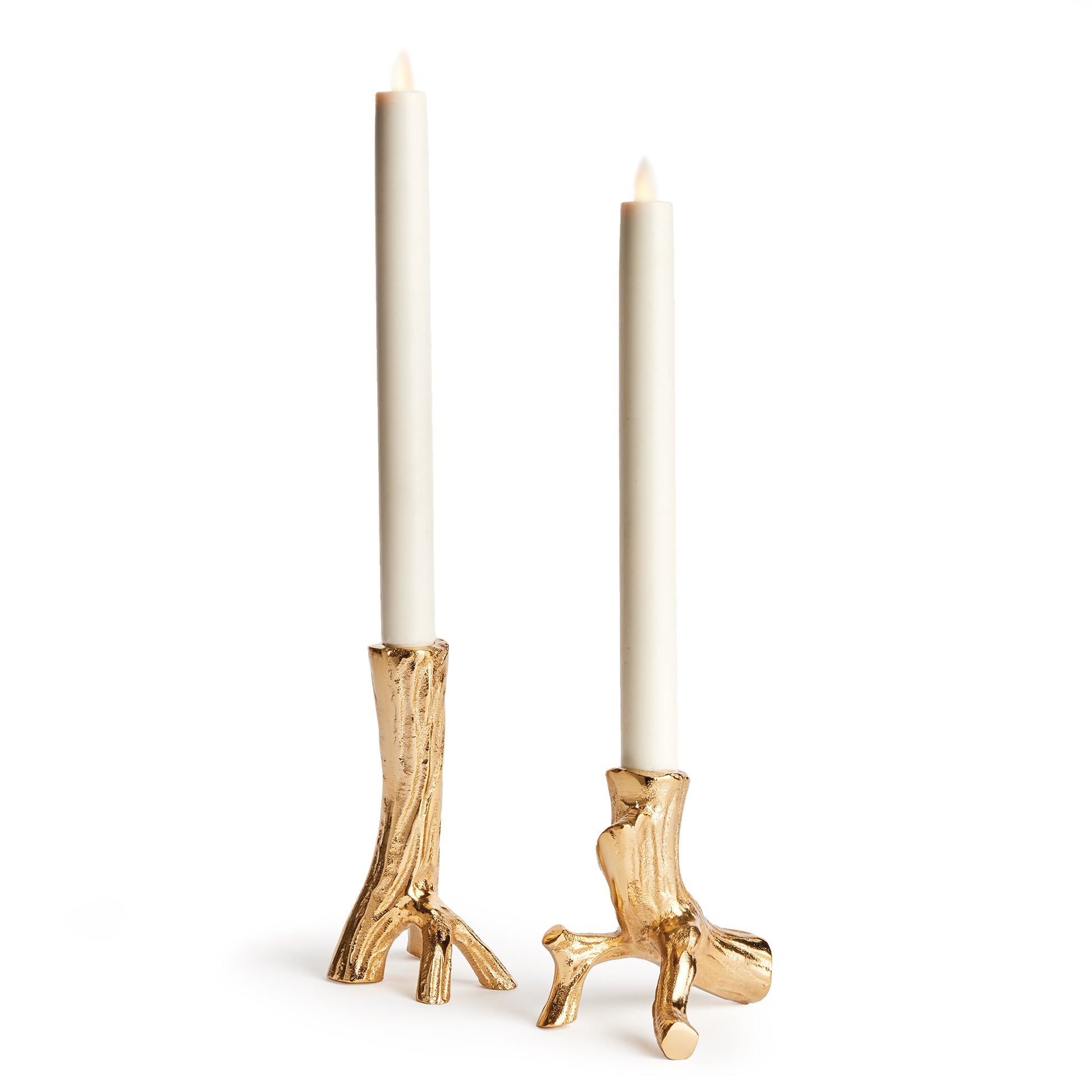 Made from hand-sculpted molds and in solid cast aluminum, these taper holders in warm gold are a substantial accent. Pair with any style taper candle and watch them glow.