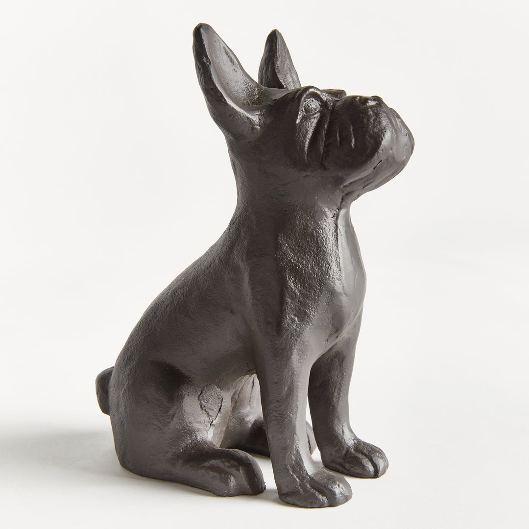 Sculpted dog figure in profile view, matte black finish and solid build emphasize form and visual weight of 3 lb material.