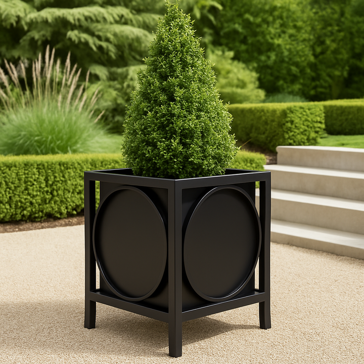 Black iron planter styled in an architectural garden with structured greenery and clean modern lines, perfect for elevated outdoor design.