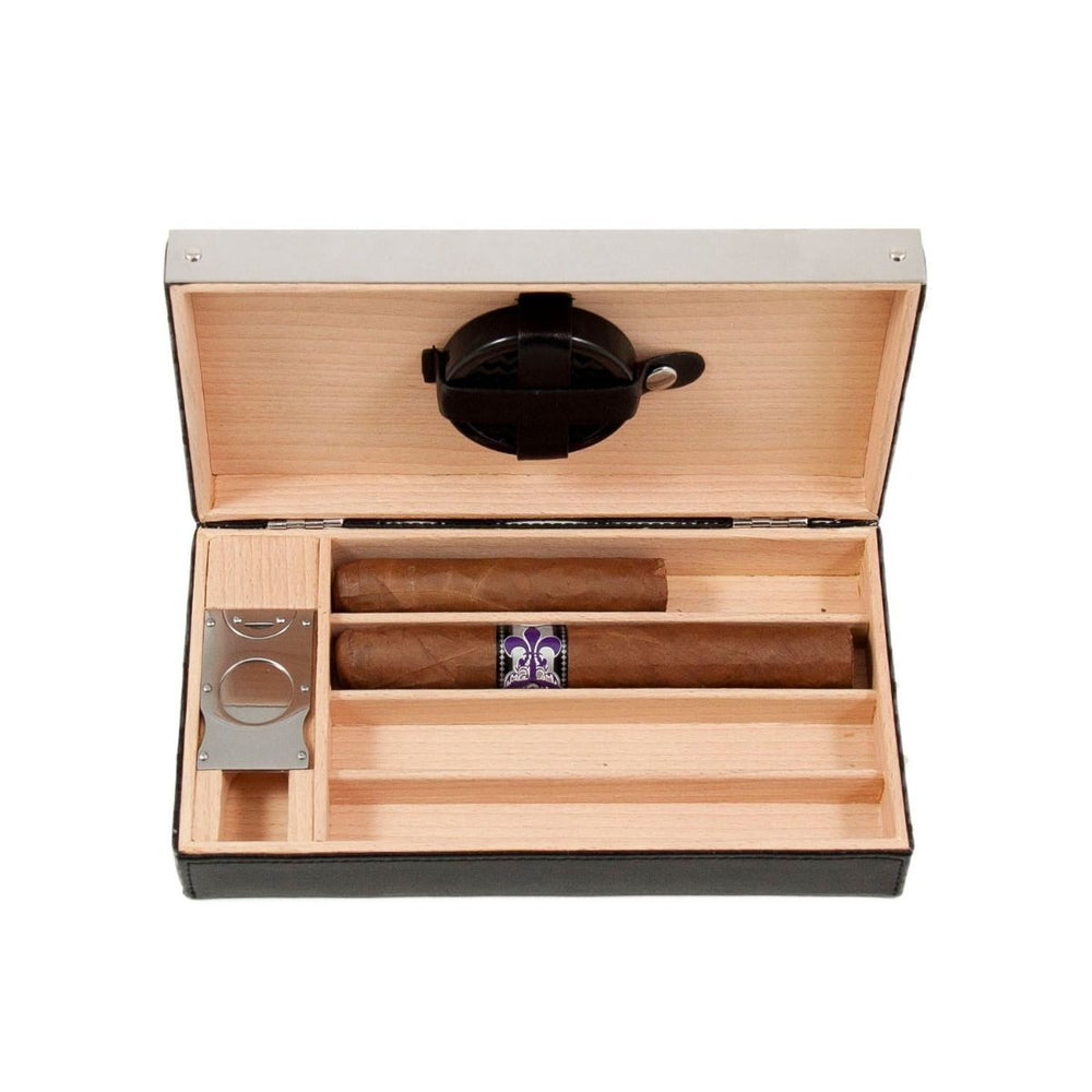 Open black leather cigar humidor with cedar-lined interior, cigar cutter, and storage for four cigars – Modern Gentleman