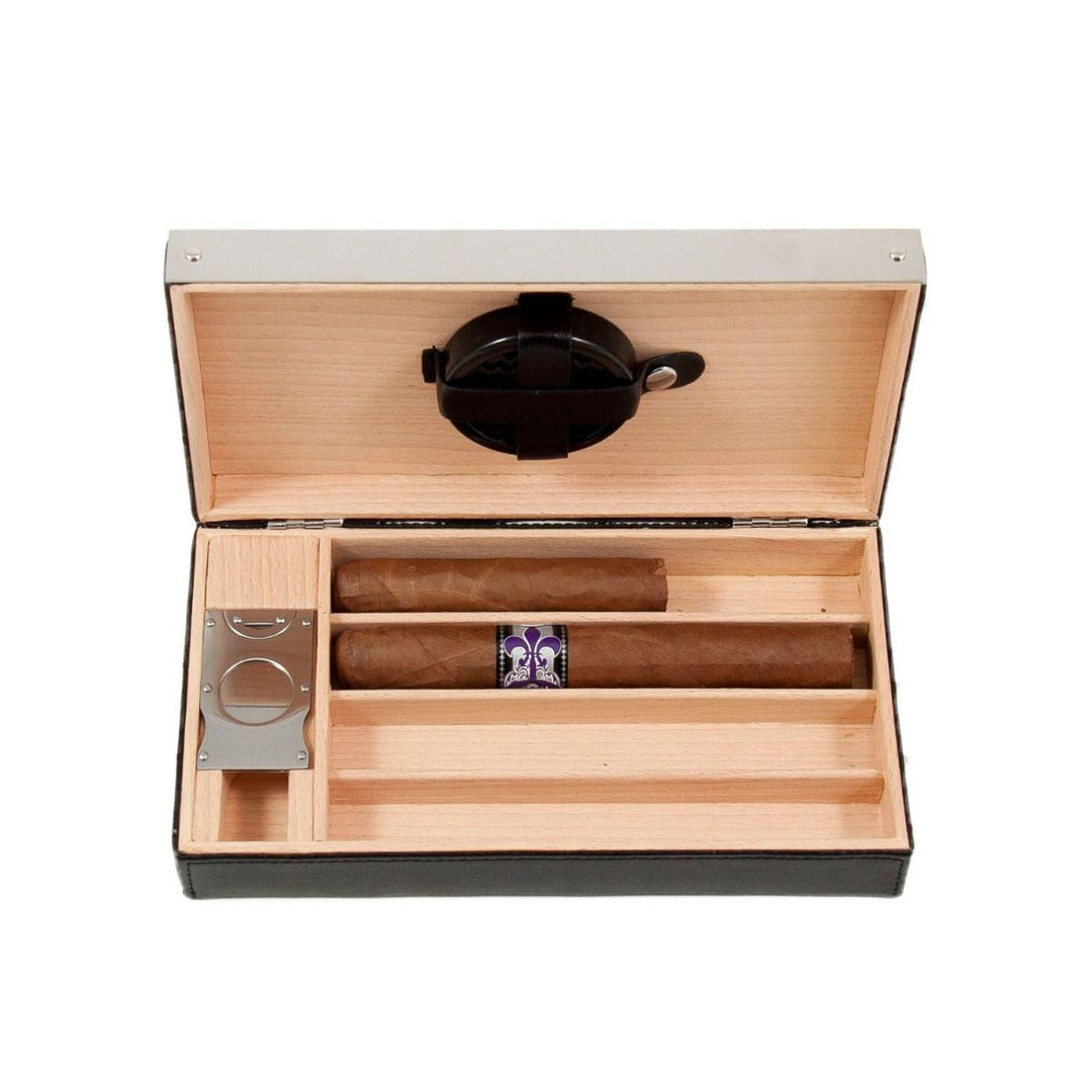 Open black leather cigar humidor with cedar-lined interior, cigar cutter, and storage for four cigars – Modern Gentleman