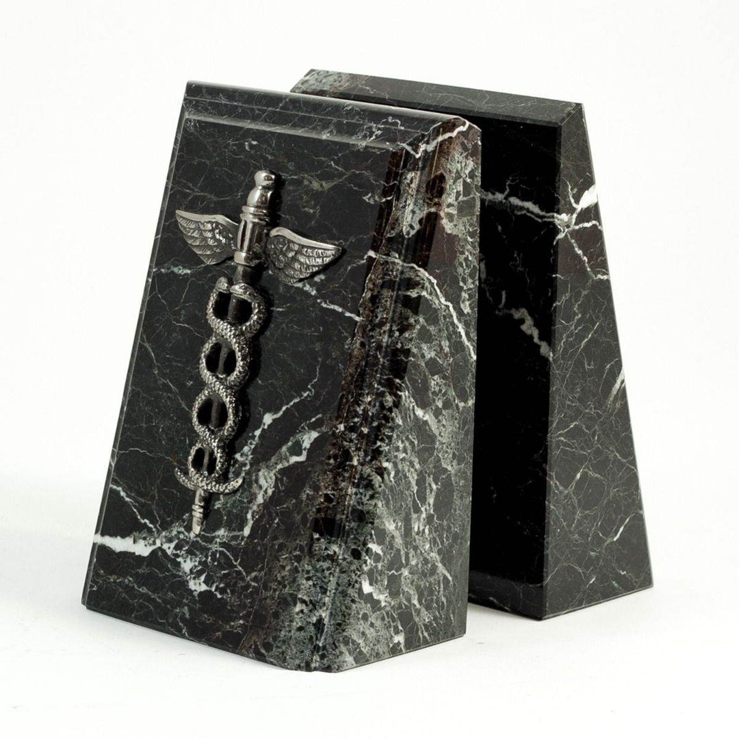 Beveled black zebra marble bookends with silver medical caduceus emblems, angled side view, decorative and functional gift for doctors – Professional Gift.