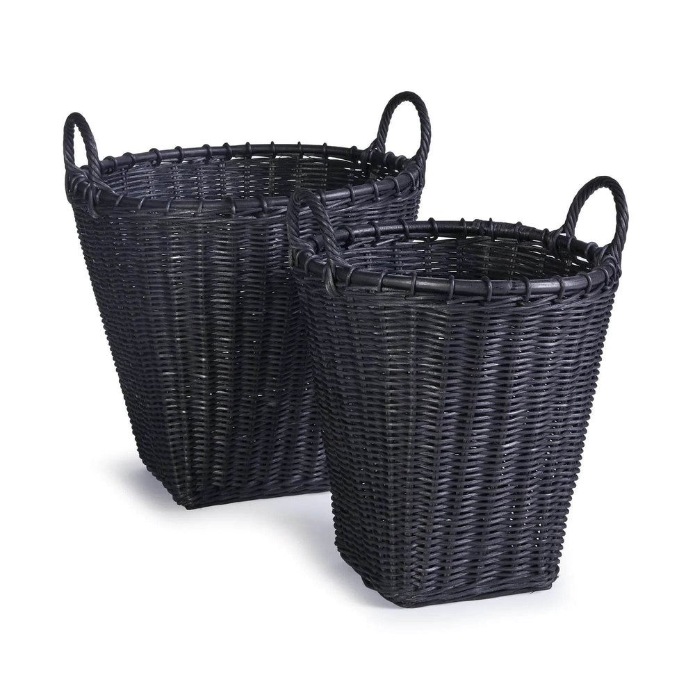 Pair of black rattan baskets with sturdy side handles, tapered woven shape on white backdrop to show texture – Modern Boho.