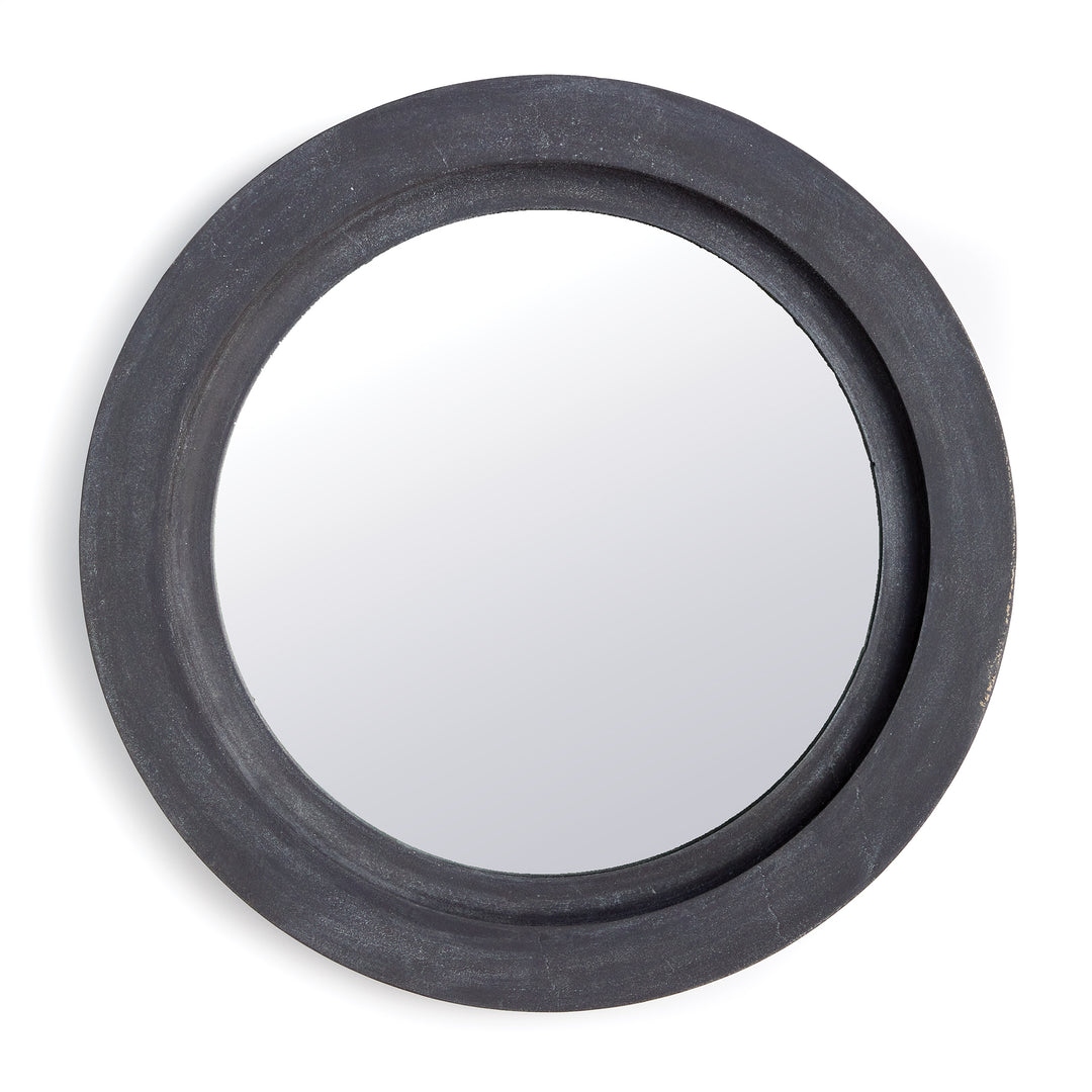 Black round wall mirror photographed at slight front angle against white background to highlight curvature and edge.

