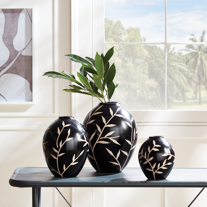 Size comparison of three black terracotta vases with etched vine patterns in large, medium, and small – Modern Organic.