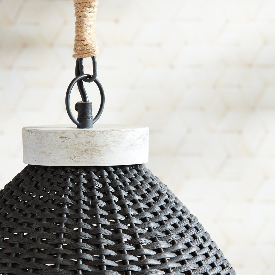 Blackwashed rattan pendant top close-up showing the pale collar, dark hanging ring and wrapped chain, Transitional style