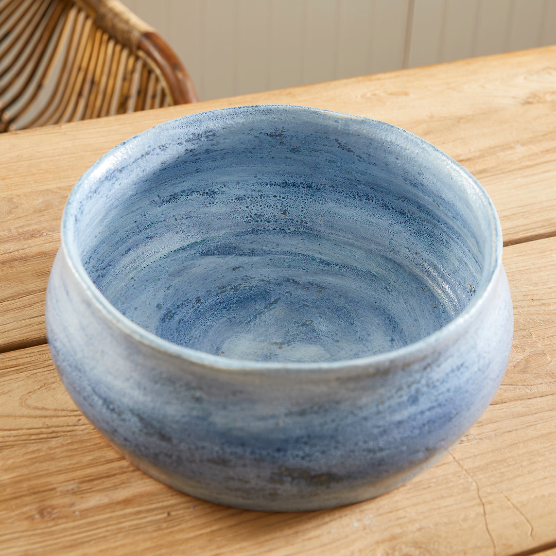 Top view of empty low round blue ceramic bowl showing glazed interior, suitable for decorative filler or drop-in plants – Coastal Transitional.