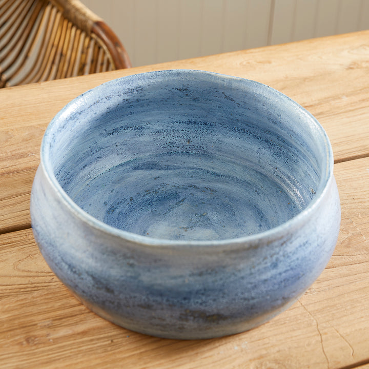 Top view of empty low round blue ceramic bowl showing glazed interior, suitable for decorative filler or drop-in plants – Coastal Transitional.