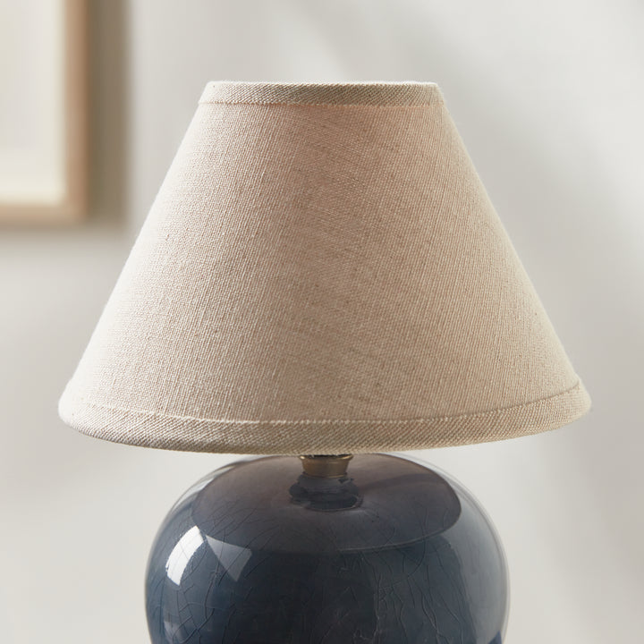 Blue ceramic mini table lamp detail showing the woven cream linen shade above its glazed round base - Coastal Transitional