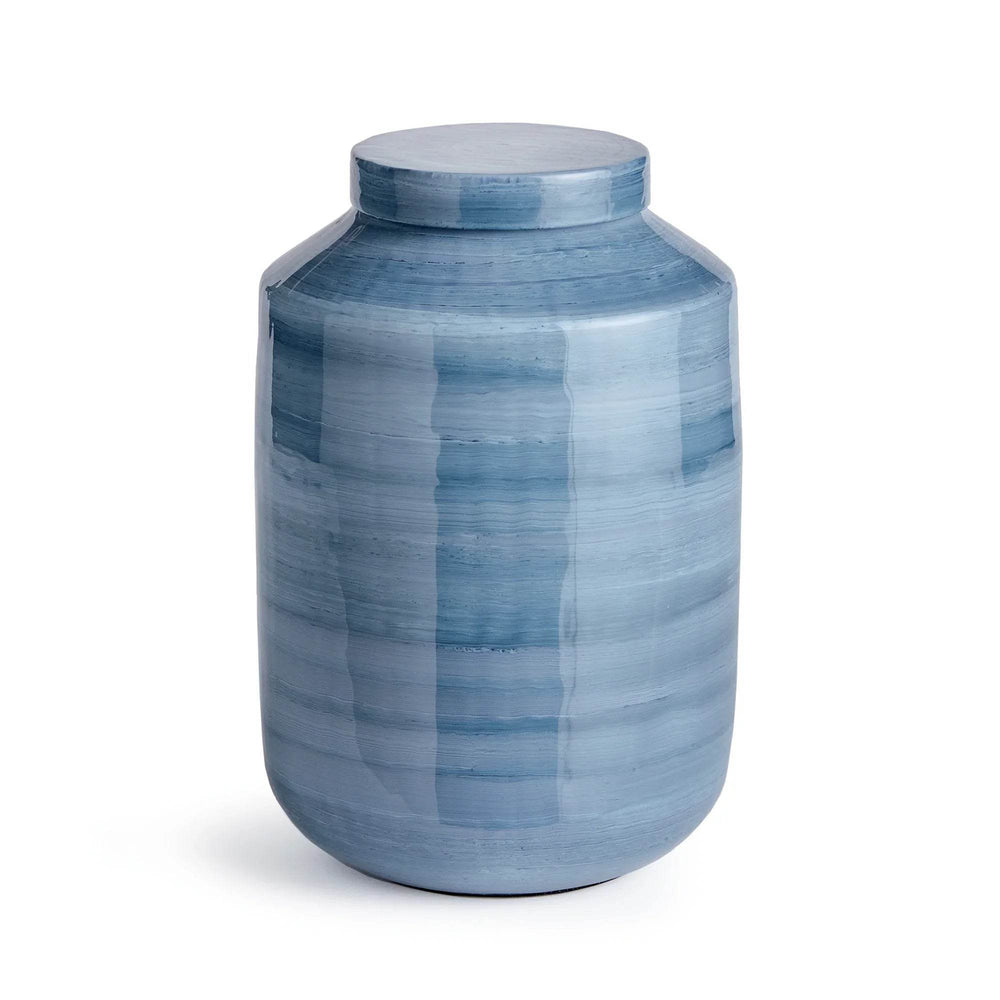 Angled view of small iron ginger jar in glossy blue gray finish, highlighting hand-painted horizontal swirl design – Coastal