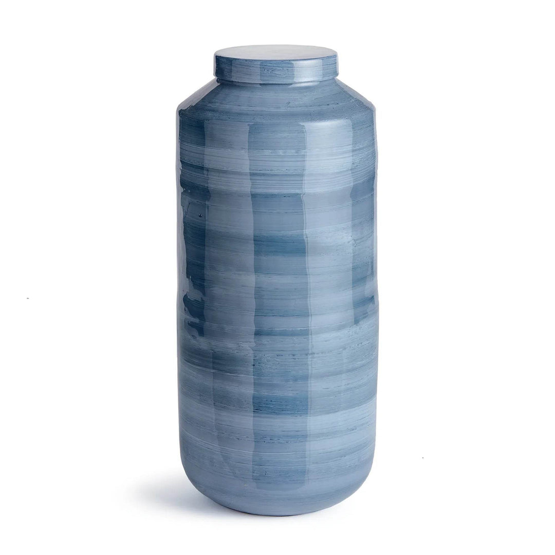 Angled view of tall iron ginger jar in glossy blue gray finish, highlighting hand-painted horizontal swirl design – Coastal