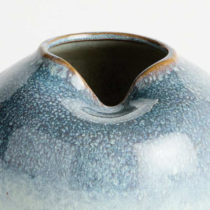 Close-up of reactive glaze texture and organic rim detailing on decorative stoneware vase – Modern Organic