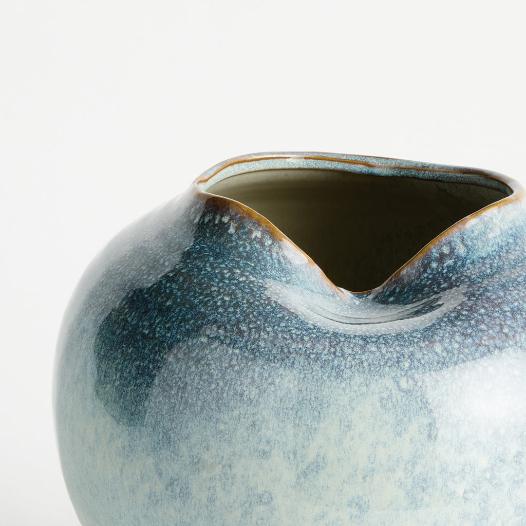 Close-up of reactive glaze coloration and tonal variation on handcrafted stoneware vase – Modern Organic