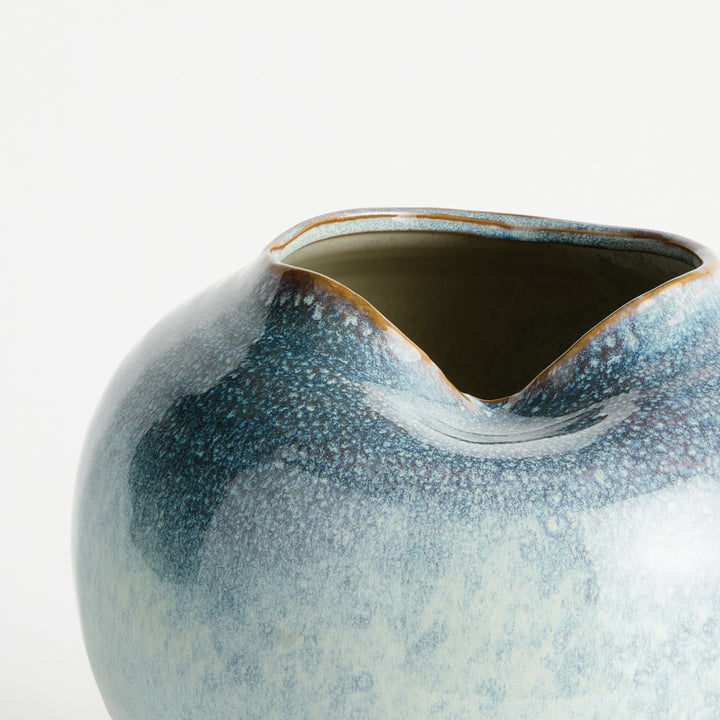 Close-up of reactive glaze coloration and tonal variation on handcrafted stoneware vase – Modern Organic