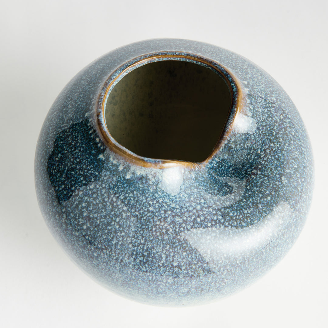 Overhead perspective of blue stoneware vase emphasizing the asymmetrical opening – Modern Organic