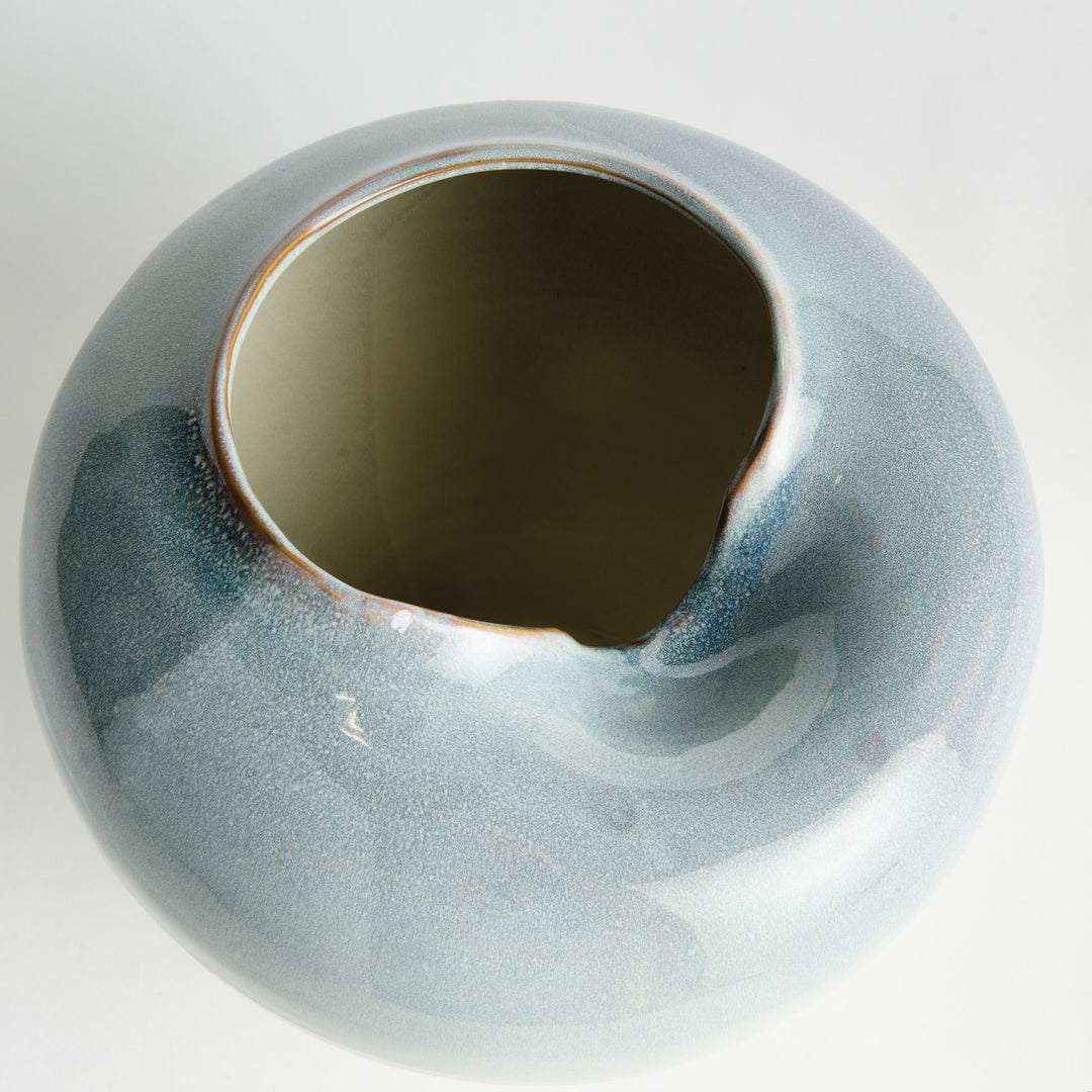 Overhead view of blue stoneware vase featuring a distinctive sculpted opening – Modern Organic