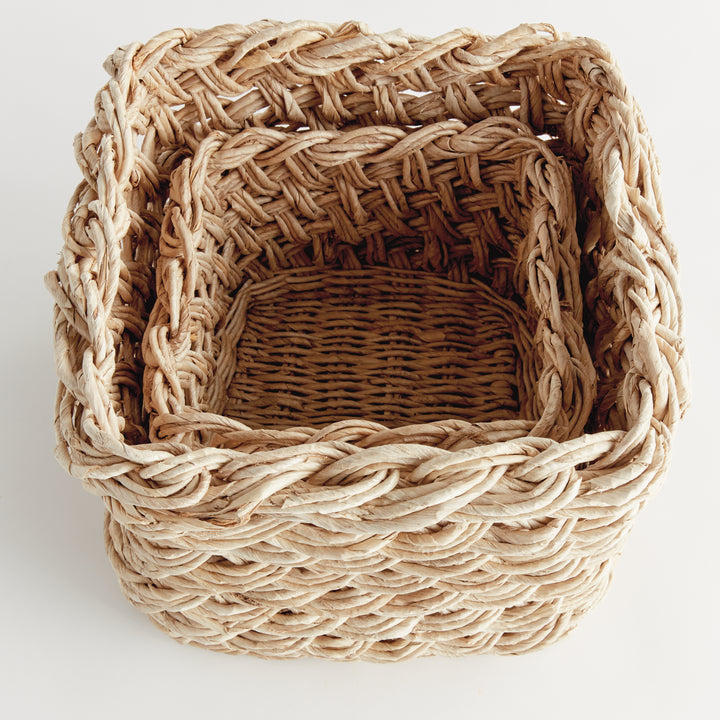 Set of 2 square abaca French braid baskets shown nested together to highlight braided weave and natural texture – Boho Storage Baskets